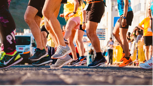 Runners before a race. Blog. How to avoid fatigue with regular exercise.