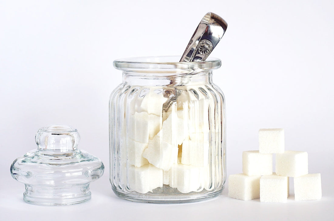 Sugar cubes in glass jar. Blog. Why is refined sugar so bad for you?